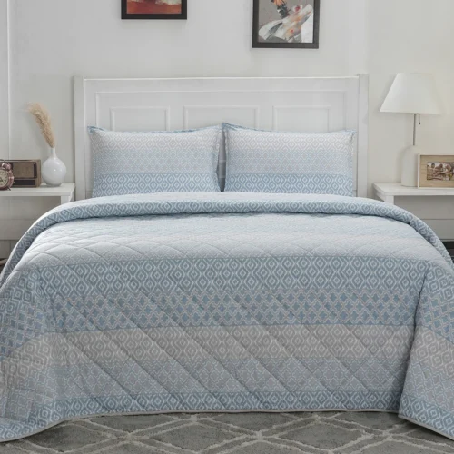 Geometric Ikat patterned quilt set for bedroom